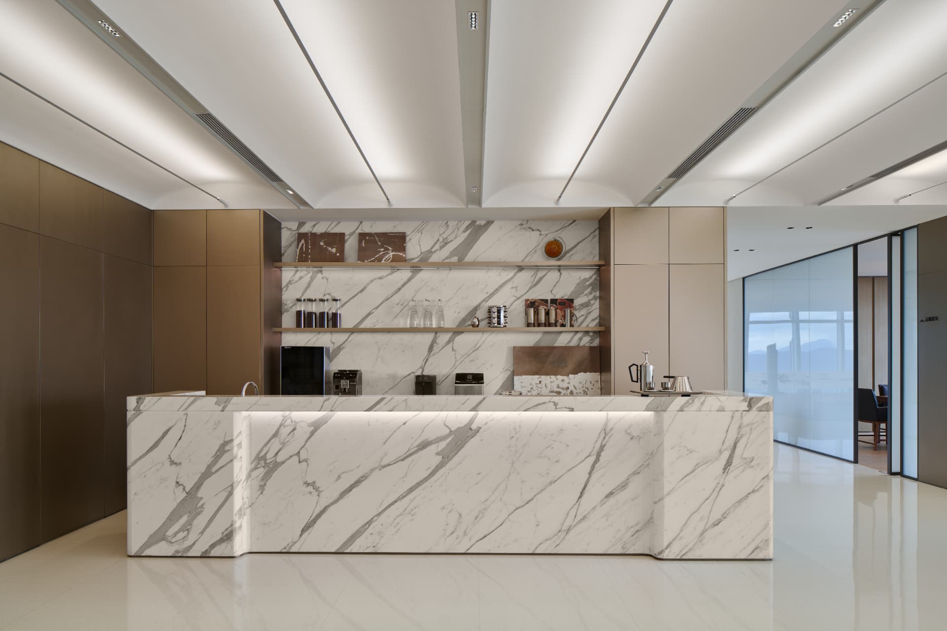No.1 Shennan Road — China: No.1 Shennan Road, Shenzhen — marble pantry counter under linear ceiling lighting