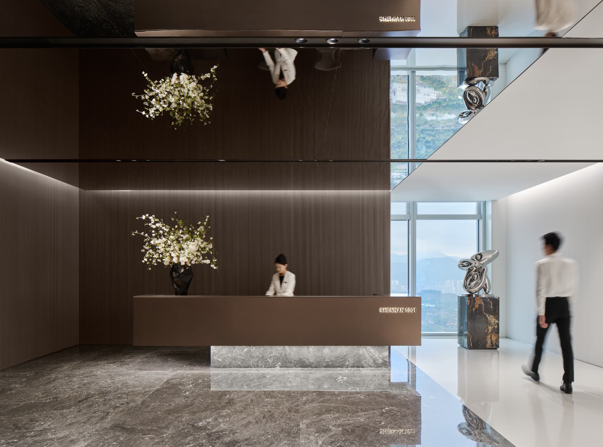 No.1 Shennan Road — China: No.1 Shennan Road, Shenzhen — reception lobby with illuminated ribbed wall and mirrored ceiling