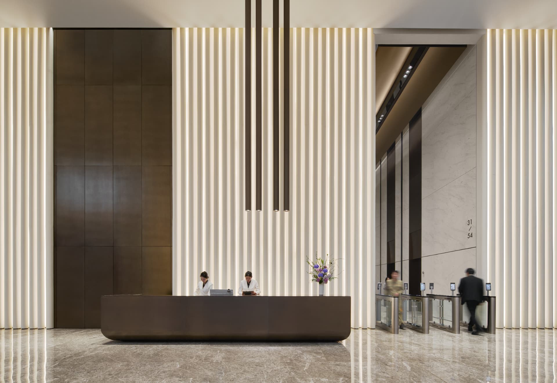 No.1 Shennan Road — China: No.1 Shennan Road, Shenzhen — main reception desk in front of the illuminated fluted wall