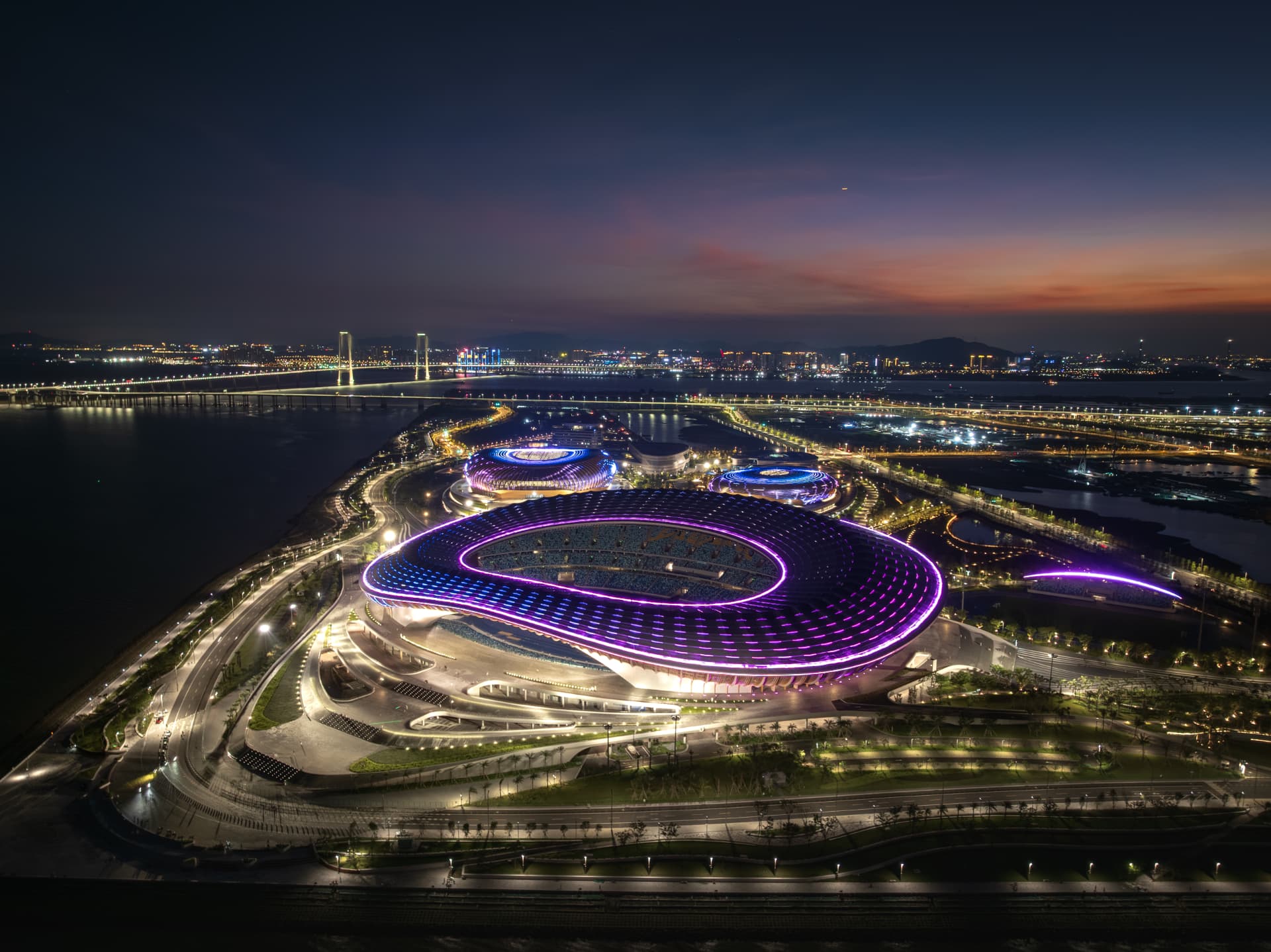 Nan Sha Stadium — Guangzhou, China: Nan Sha Stadium, Guangzhou — main stadium roof in violet and blue light