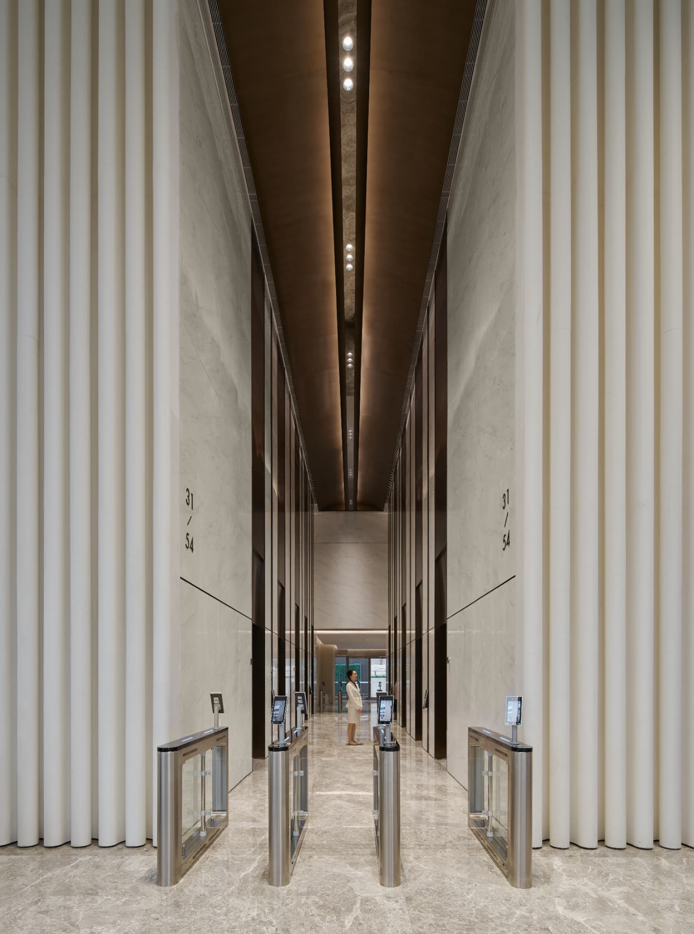 No.1 Shennan Road — China: No.1 Shennan Road, Shenzhen — entrance gates in the double-height lift lobby